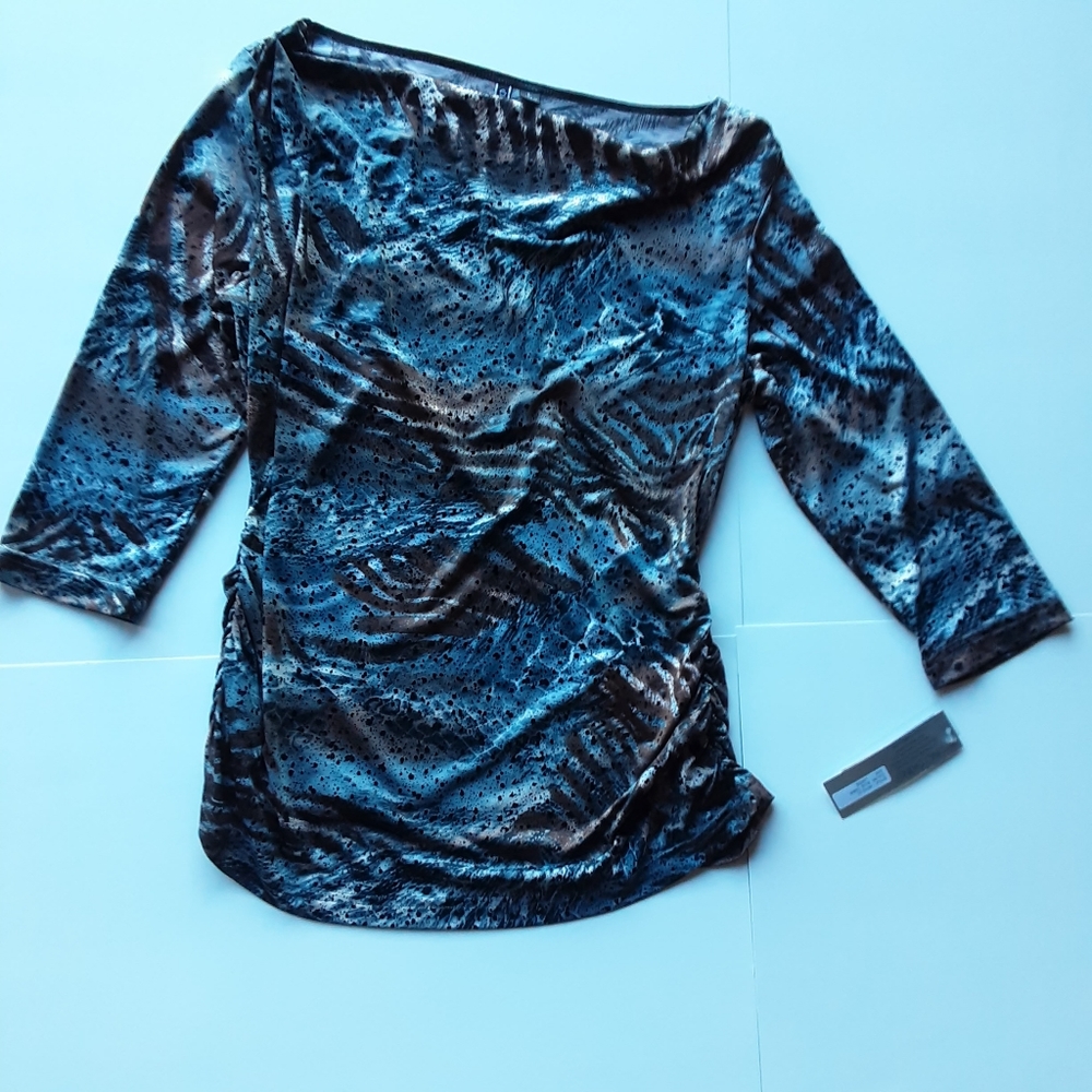 Women's shirt, size L. Never worn, with tags.